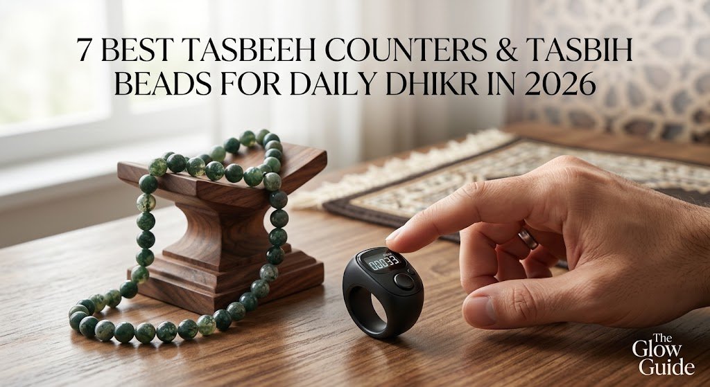 A modern digital zikr ring counter and traditional green stone prayer beads resting on a wooden table.
