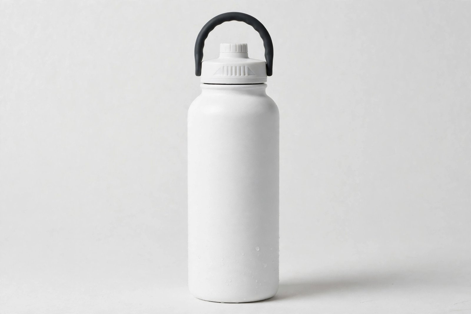 Hydro Flask 32 oz white insulated wide mouth water bottle, studio product shot